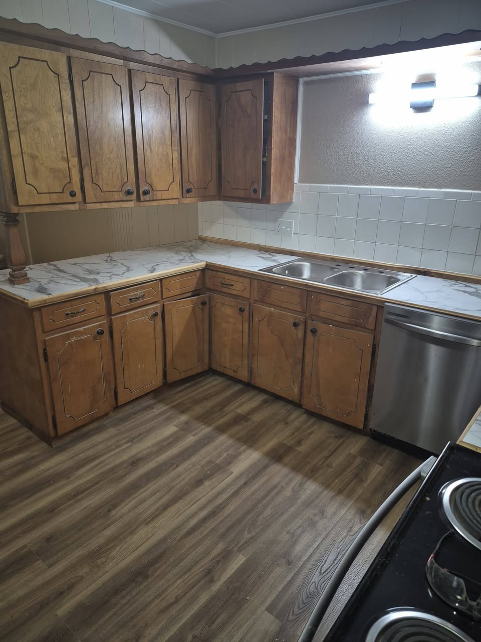 Second view across an updated kitchen and countertop